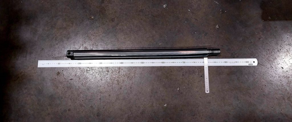 A bent rod from a hydraulic cylinder repaired by A1 Hydraulic Engineering reman rod re-rod